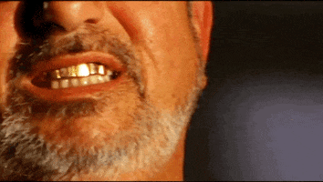 gold teeth GIF by The Maury Show