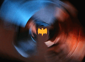 smokey batman spinning GIF