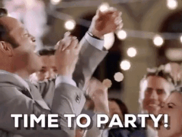 Movie gif. Vince Vaughn as Jeremy Grey in Wedding Crashers stuffs cake into his mouth while standing next to the bride and shouting "Time to party." 