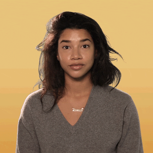 Celebrity gif. Hannah Bronfman smiles and raises two thumbs up with an enthusiastic “Yeah.”