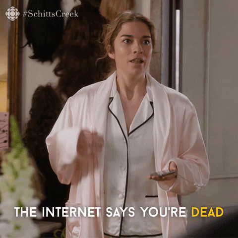 Schitt’s Creek gif. Annie Murphy as Alexis holds a phone as she looks ahead concerned. Text, "The internet says you're dead."