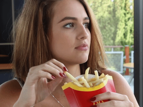 Image result for pretty girl eat mcd french fries