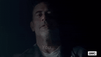 threatening the walking dead GIF