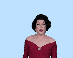 Video gif. Bobbi DeCarlo shrugs as she turns her head to the side and says, "I don't know." Text, "IDK?"