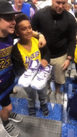 Young Lakers Fan Gets Emotional After Lebron Gifts Him Sneakers