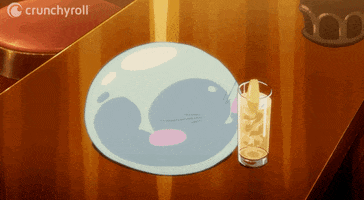 Kawaii gif. Small blue slime blob creature with closed eyes crawls on a bar counter towards a drink glass. The blob picks up the tall glass and tilts the drink towards its face.
