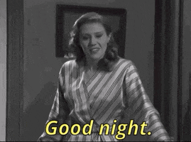 SNL gif. Comedian Kate McKinnon closes a door behind herself while saying "Good night!"