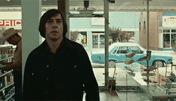 javier bardem cool guys dont look at explosions GIF