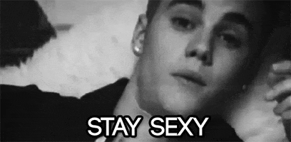 Celebrity gif. Black and white video of Justin Bieber pointing at us and saying, "stay sexy."