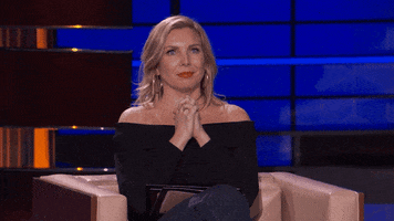 TV gif. June Diane Raphael on To Tell the Truth clasps her hands together in prayer while her eyes shift sideways like she's confused about what's happening.