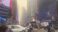 Hazy Times Square Draws Crowds Despite Air-Quality Warnings